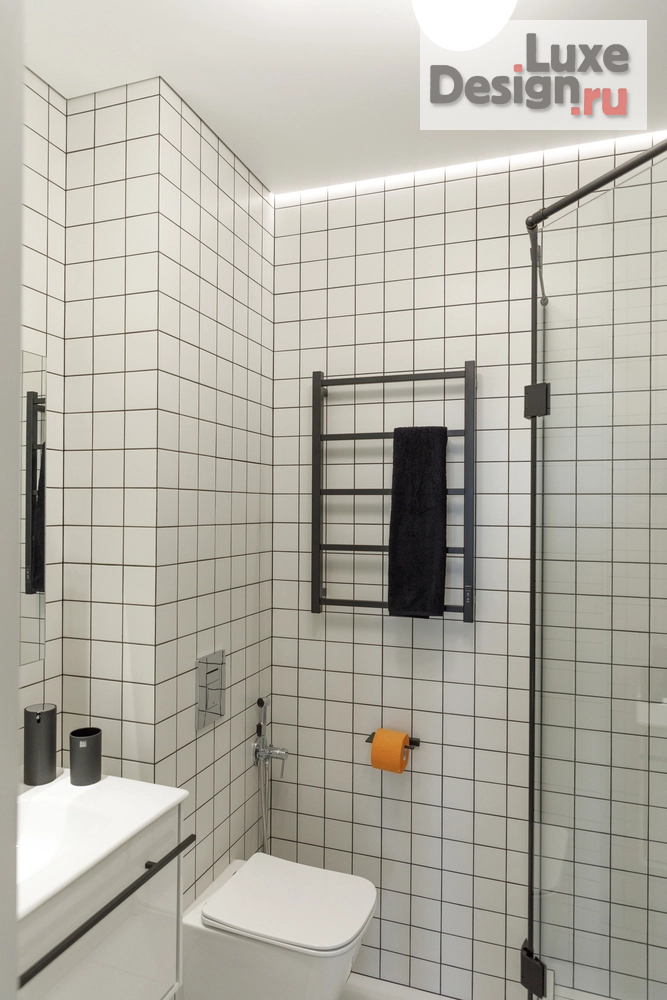 Дизайн интерьера квартиры студии "Белый квадрат - оранжевый протест (фотосъемка)" (фото 9)